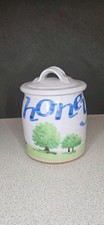 Hand Painted Studio Pottery Honey Pot With A Yellow Bear And Beehive Decoration.