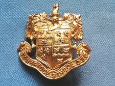 Staybright/anodised.The Tonbridge School Officer Training Corp cap badge.