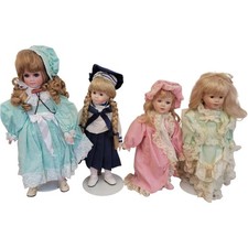 Vintage Porcelain Dolls Set in Victorian Dresses Collectible Decor