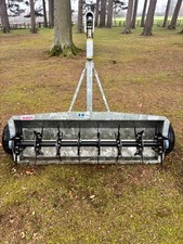 Logic lawn slitter for quad