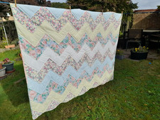 Patchwork quilt, pastel chevrons, floral, machine quilted.  Dble bed/sofa throw