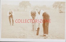 c 1910 Men Playing cricket