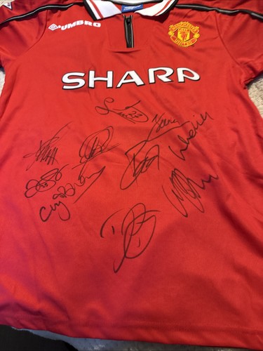 Multi signed utd shirt - signed,