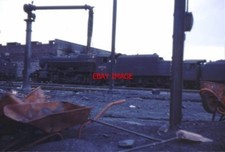 PHOTO  STANIER 8F 48723 ROSE GROVE BURNLEY 7/68  STANDS OUT OF STEAM WHILE IN TH