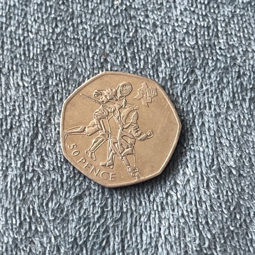 2011 50p fencing olympic coin - olympic,