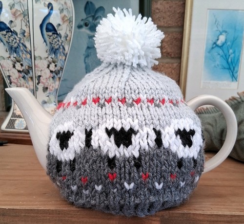 Hand knitted multi - hand,