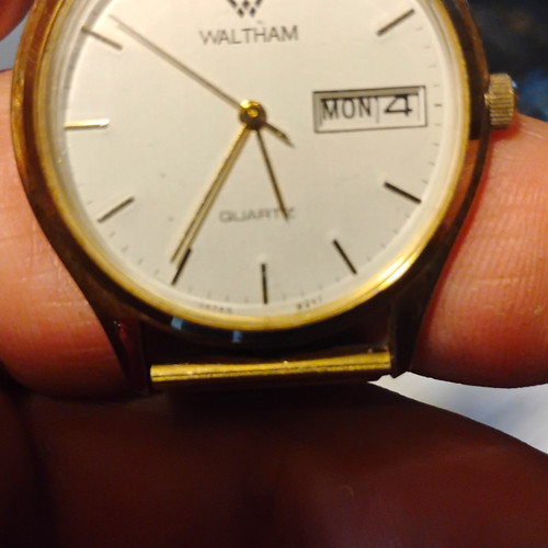 Waltham quartz analog watch - waltham,