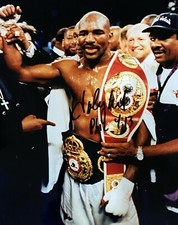 An original signed photograph by Evander Holyfield (with COA)