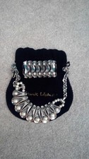 Frank usher matching chunky metal necklace and bracelet