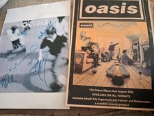 "OASIS " SIGNED PHOTO PLUS