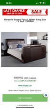Brown leather king size bed