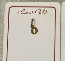 9 ct gold  mixed pendants