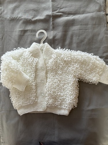 Hand knitted baby - hand,