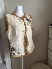 Cream and tan faux fur vest