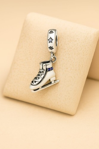 Ice skates dangle - ice,