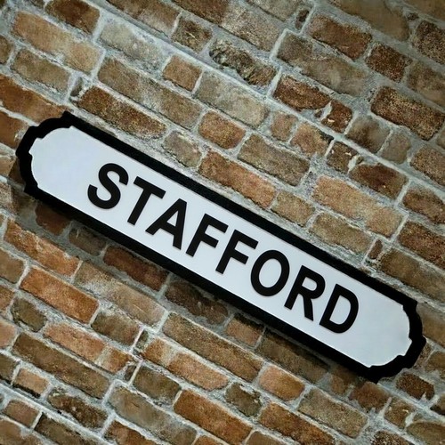 Stafford sign wooden faux - sign, cast