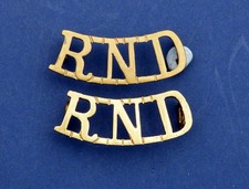 Pair of WWI "RND" (Royal Naval Division)  brass shoulder title.