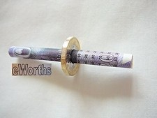 Cigarette through 1 coin - cigarette,