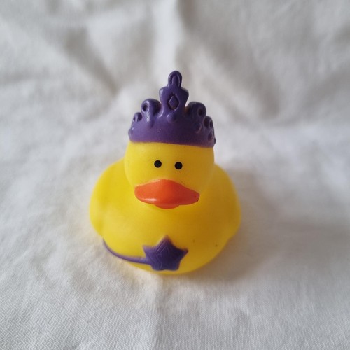 Yellow rubber duck with purple - with,