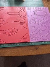 Two Christmas Embossed Boards.