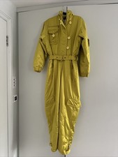 Vintage Bogner skiing onepiece. Gold/Yellow Colour Size 6