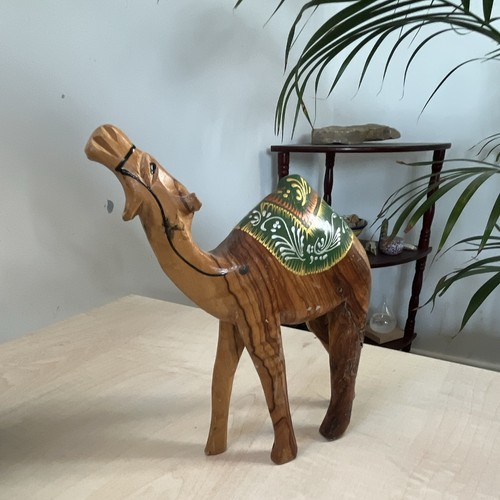 Hand carved wooden camel - hand,