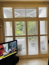 Plantation white door folding shutters