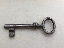 fairly large victorian or edwardian shiny steel key with a hollowed out end