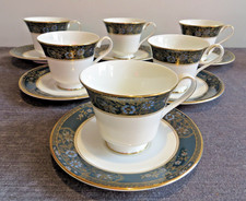 SIX ROYAL DOULTON TEA CUPS AND