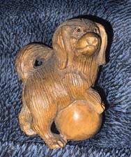 Antique Boxwood signed Netsuke Dog With Ball 4.5cm length,5cm Height.Glass eyes