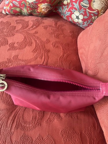 Longchamp nylon toiletry bag.