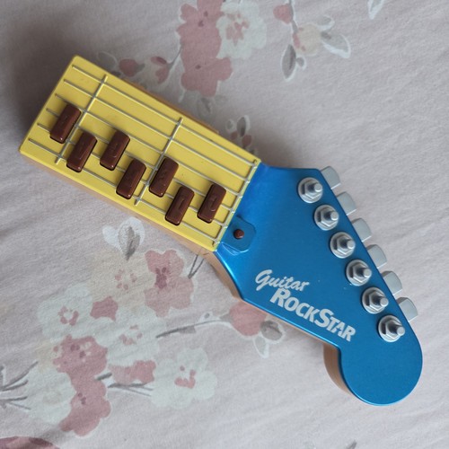 Tomy practise air - guitar, toy