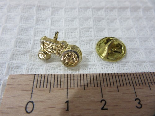 Gold tractor pin badge - gold,