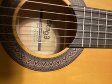 stagg handmade classical guitar with teaching books and soft case