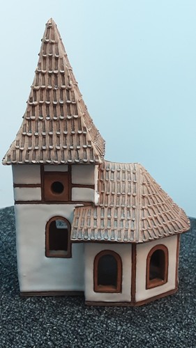 Hand made pottery house - hand,