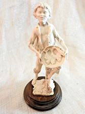 Giuseppe Armani Boy Selling