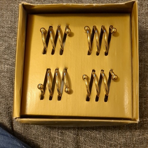 Set coil brass napkin - set,