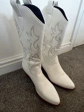 White heeled  cowboy boots