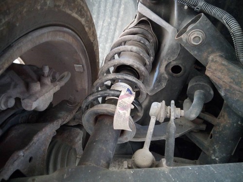 Rear left shock absorber - left,