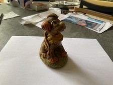 RARE PENDELPHIN DOG WITH BERRY AND SCARF. ONE OF THE RAREST FIGURES. GOOD COLOUR