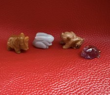 FOUR MINATURE STONE ANIMALS -
