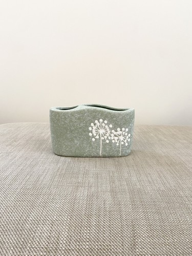 Next sage green flower - next,