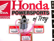 NEW GENUINE HONDA CARB +