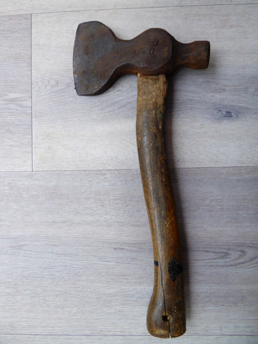 Vintage hand axe with - hand,