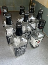 7 x 1 Litre Jack Daniels bottles (empty no alcohol) + 1 Jim Beam bottle crafts