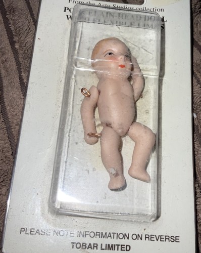 Porcelains headed doll astu - headed,