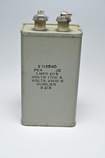 Paper in oil capacitor