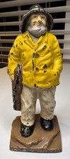 Antique Cast Iron Fisherman