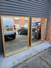 Pair Of Identical Large Gilt Acanthus Framed Mirrors.