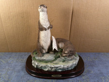 THE JULIANA COLLECTION OTTER GROUP MADE OF RESIN 1998